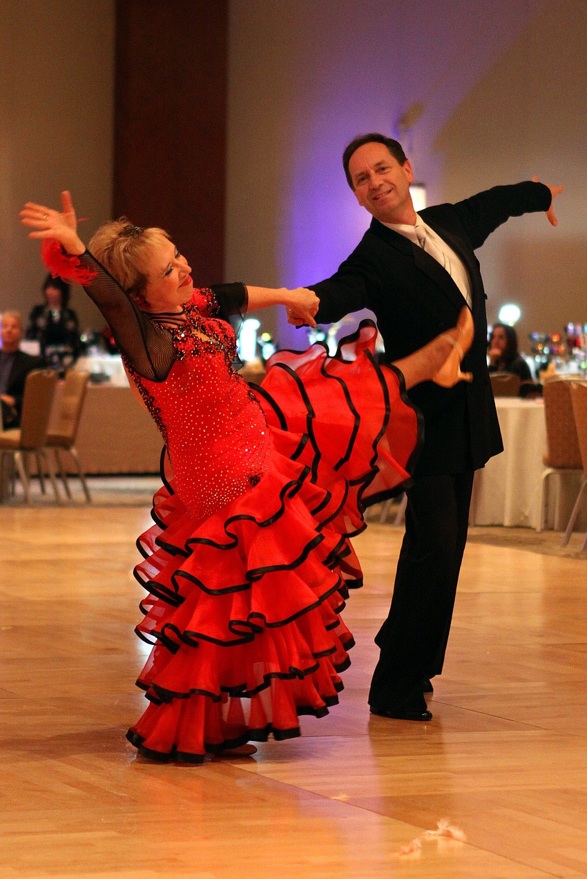 Eva Laukhuff and Bogdon Wienc have some fun on the dance floor, Sunday, Jan. 15, during the Sarasota Challenge at the Hyatt Regency.