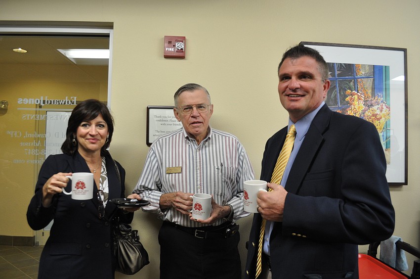 Advertising Representative Laurie Gomes for The Herald Tribune, Board Member for St. Armands Circle Association Glynn Armitage, and Ad Manager for The Herald Tribune Ron Belyea.
