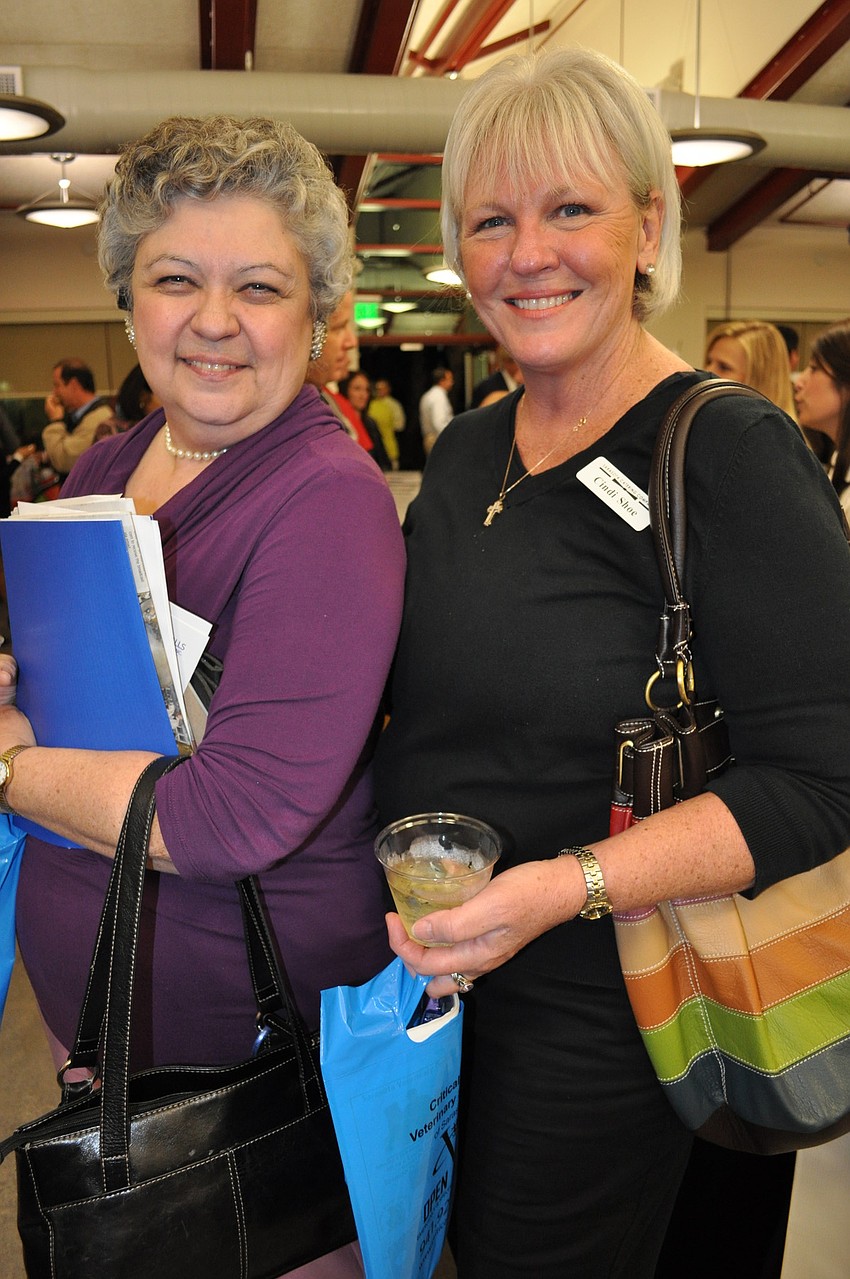 Ronnie Caron, of Caron Realty, with Cindi Shoe, of Sarasota Catering Co.