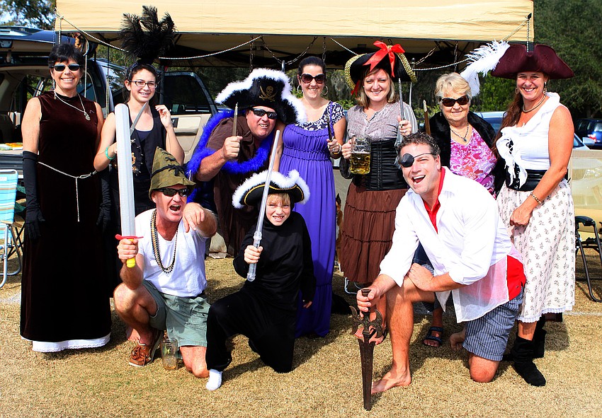 Sheryl Levin, Sarah Allen, 11, David Allen, Kerrin Naeff, Stephanie Merrithew, Barbara Hanson, and Judy Hanson, stand behind, Dana Hanson, Jasper Merrithew, 8, and Anthony Merrithew