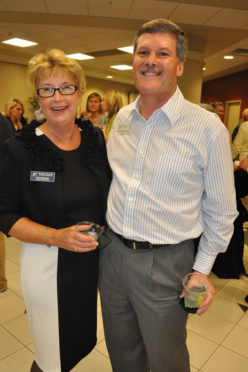 Doris Berkley, of Big Brothers Big Sisters of the Sun Coast, with Tom Roberts, of A New Approach