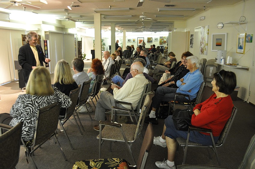 Kenard Chandler performs illusions for the audience