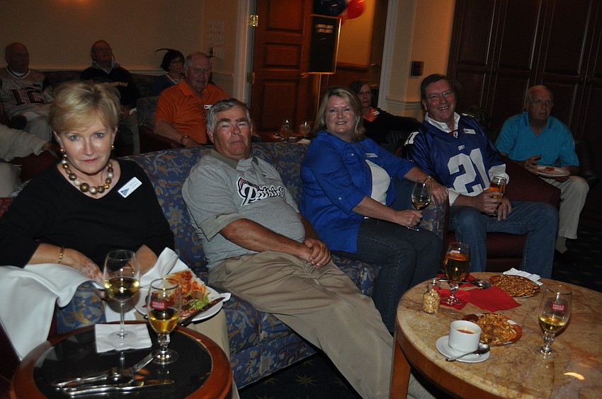 Serious fans Barbara Gardner, Ned Pike, DeDe and Mike Gray