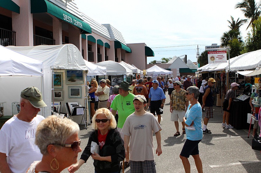 Thousands of people enjoyed walking around the Siesta Key Craft Festival Saturday and Sunday.