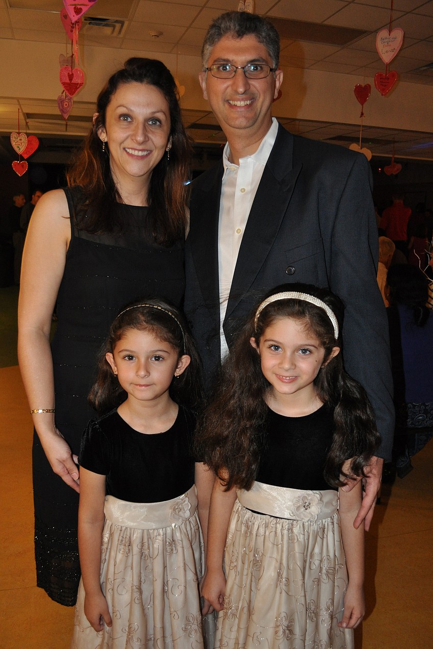 Drs. Dora Jarquin and Farhad Foroughi came out with their daughters, Kayla and Kiana.