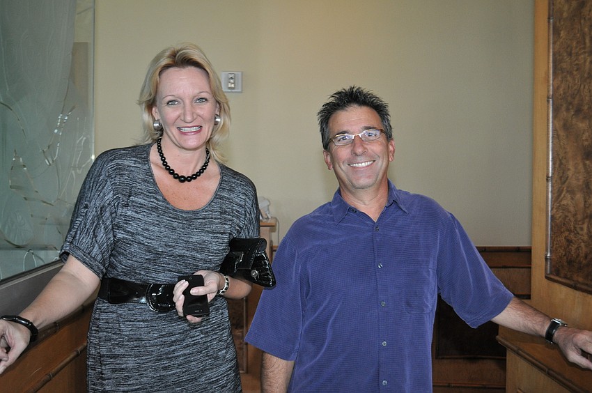 Dawn Mims with the The Longboat Key, Lido Key, St. Armands Key Chamber of Commerce; and Jeff Vermillion with ServPro