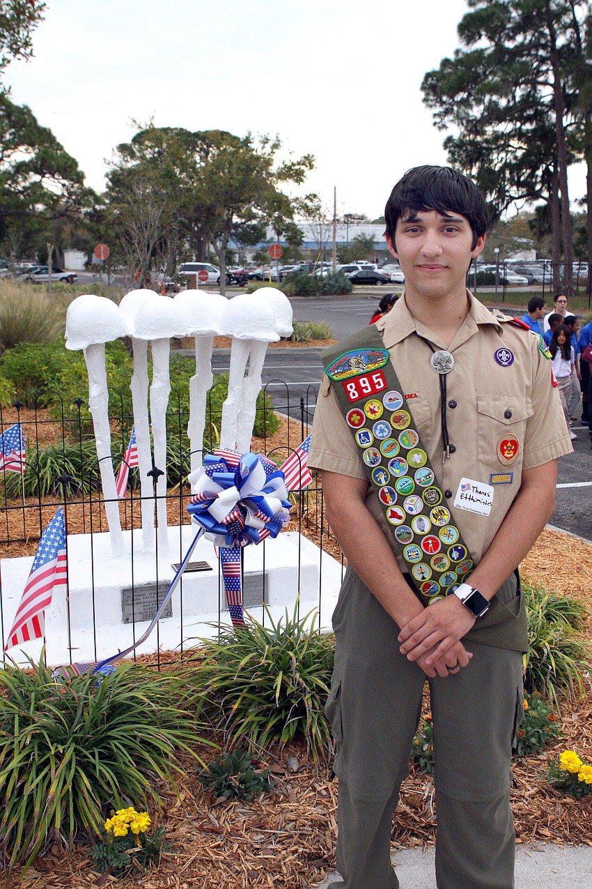 Anthanasios Efthimiades, 16, stands next to the Veteran's Memorial he restored for his Eagle Scout Project, Friday, Feb. 17, during the Veteran's Memorial Re-dedication Ceremony at Alta Vista Elementary.
