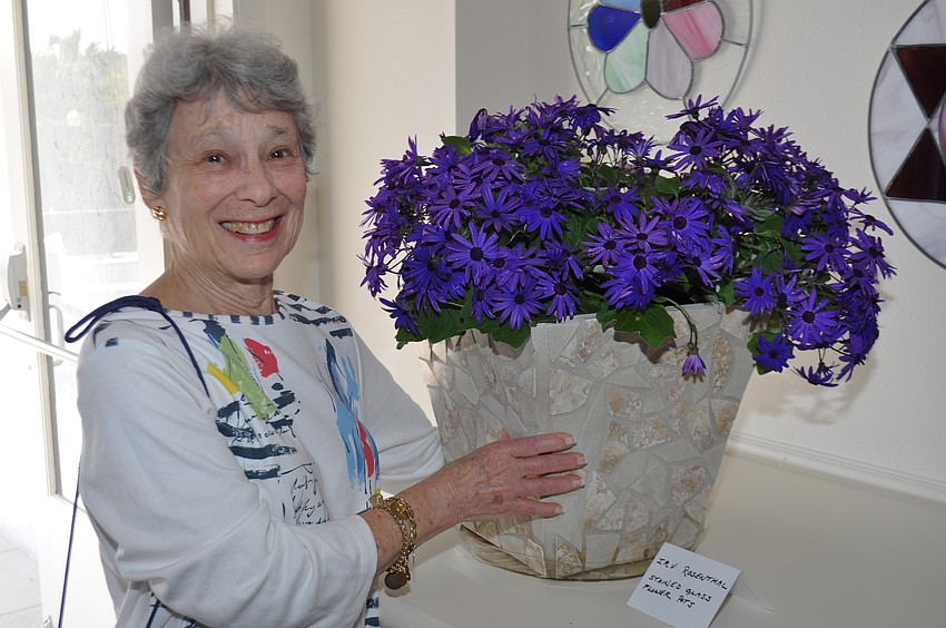 Carol Kaufman with Irv Rosenthalâ€™s stained-glass flowerpots