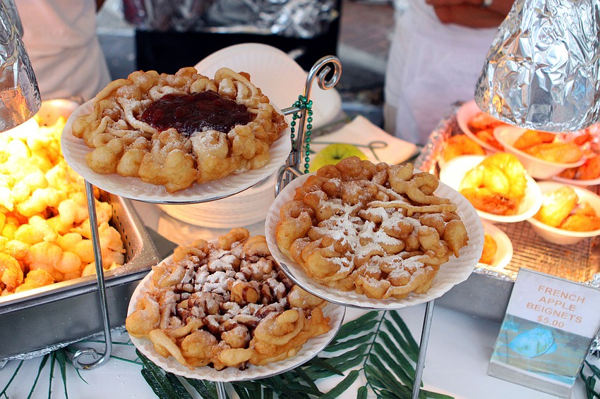Funnel cakes were for sale at the Paris Festival booth, during the 24th Annual Downtown Sarasota Art Festival, Sunday, Feb. 19.