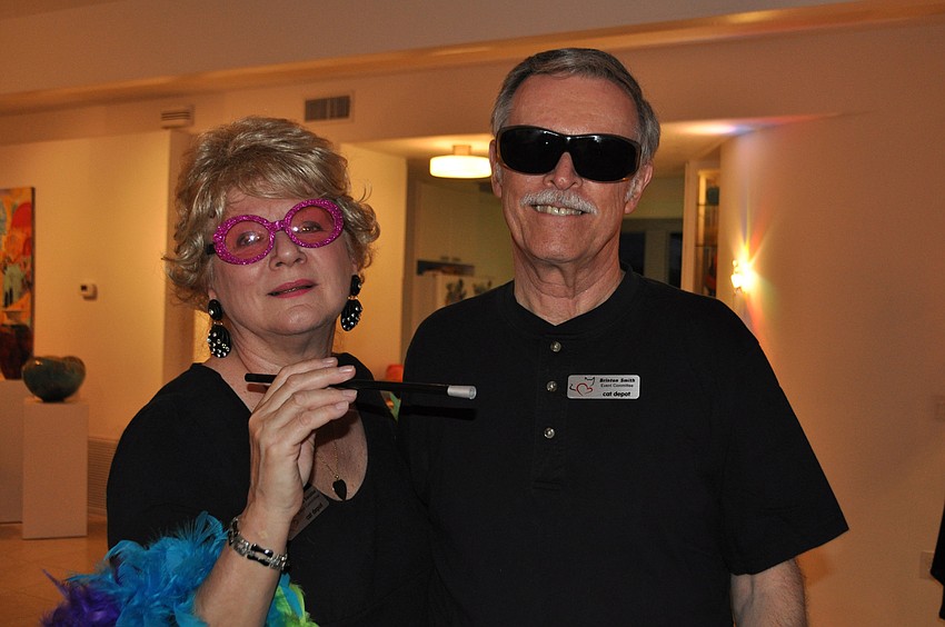 Mellonie Smicklas and Brinton Smith prepare for the Oscars Academy Awards ceremony.