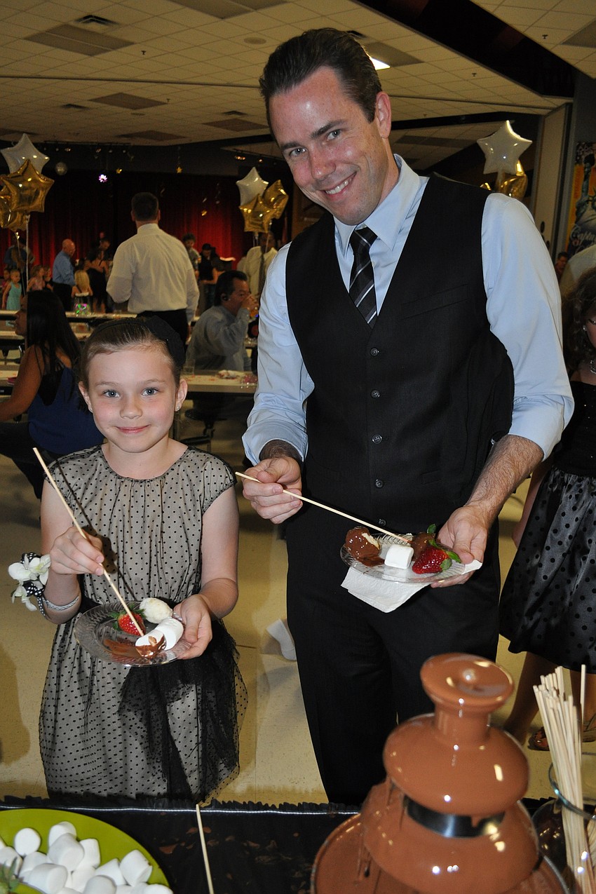 Taylor and Jason Rew treated themselves to chocolate-covered marshmallows and other treats.