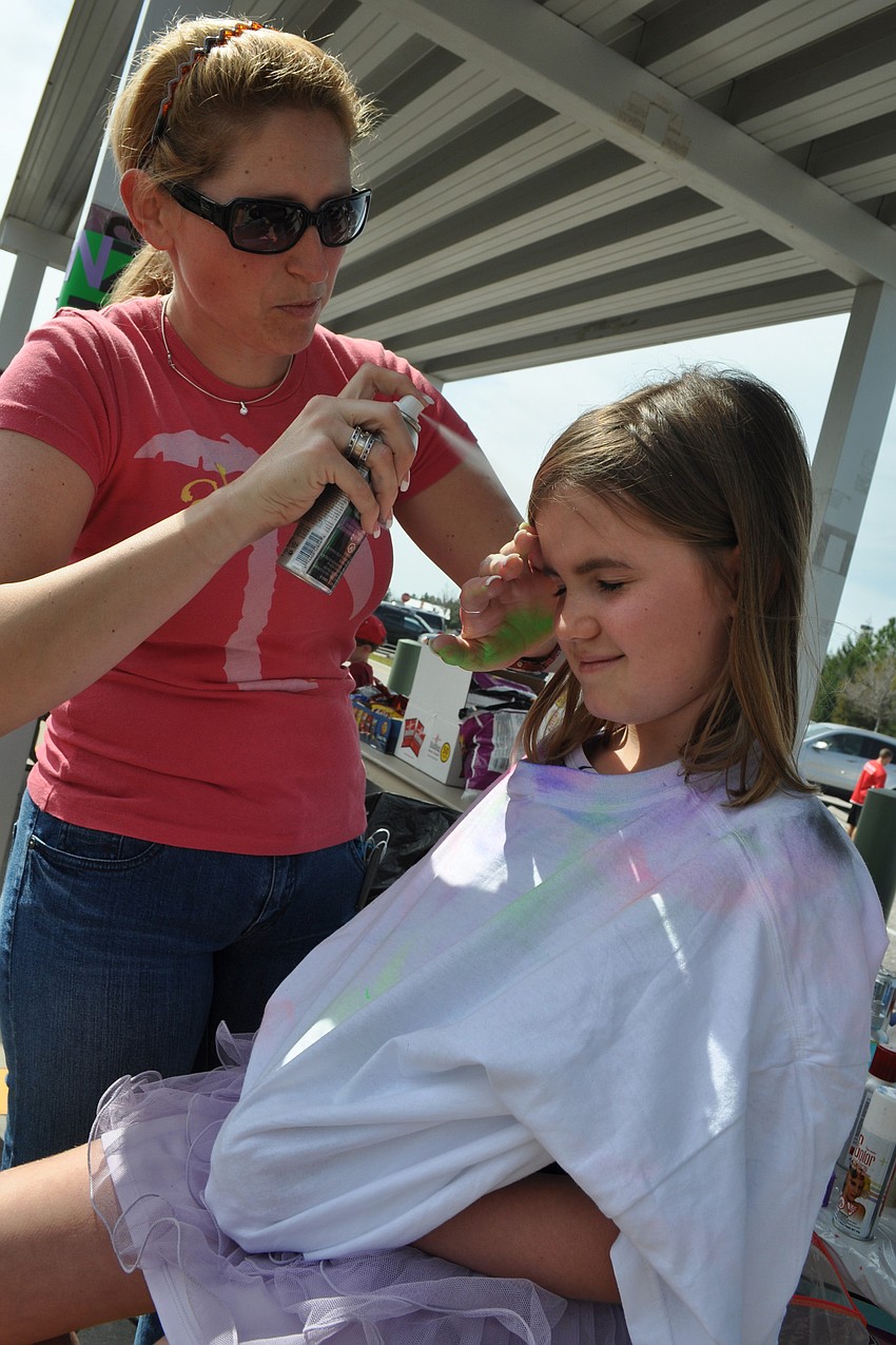 Jen Ducharme painted Hailey Hirterâ€™s hair pink and purple.