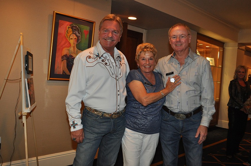 Manager Rob Edwards with Sue and Jim Hanes