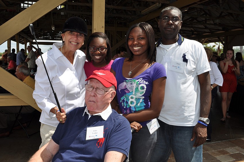 Suzette Lodge, with her husband, John, front, and Bertha, Ruth and Anis Celestin