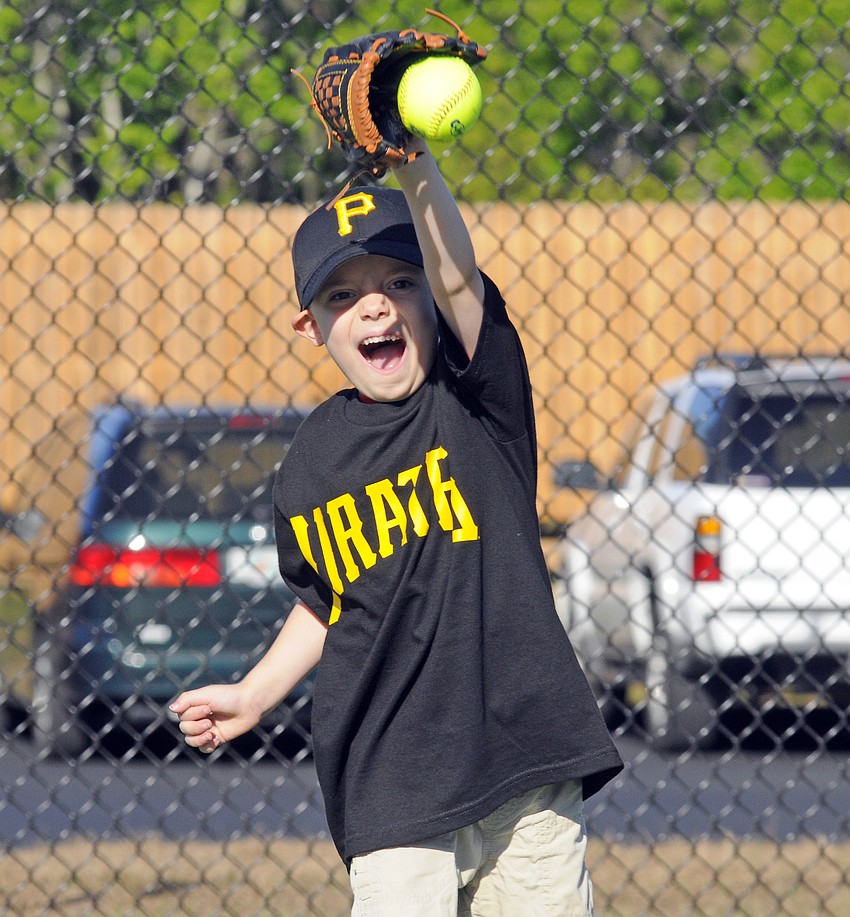 Five-year-old Trent Hermann loved playing catch in the outfield.