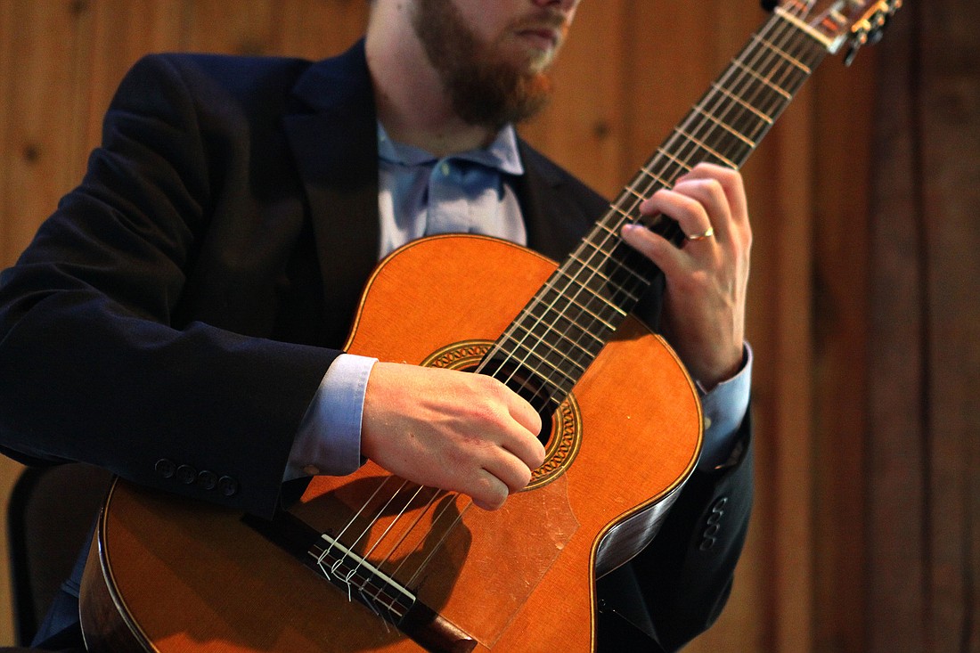 Your Observer Photo Dr. Zachary Johnson played for a crowd at