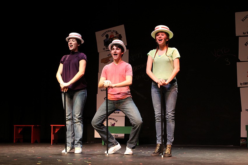 Elizabeth Panagopoulos, 15, Danny Perrone, 17, and Natalie Almeter, 17, sing, â€œLolly, Lolly, Lollyâ€, Friday, March 30, during Cardinal Mooney High Schoolâ€™s spring musical, â€œSchoolhouse Rock Live!â€.