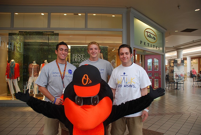 Lucas Sanchez, Hunter Towler and Mico Sanchez with the Oriole Bird.
