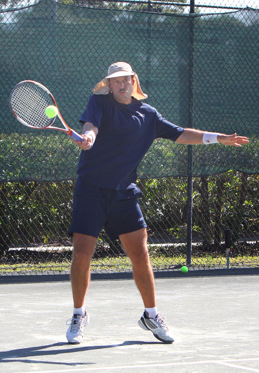 Eric Luxembourg goes to hit the ball during his match, Friday, April 6.