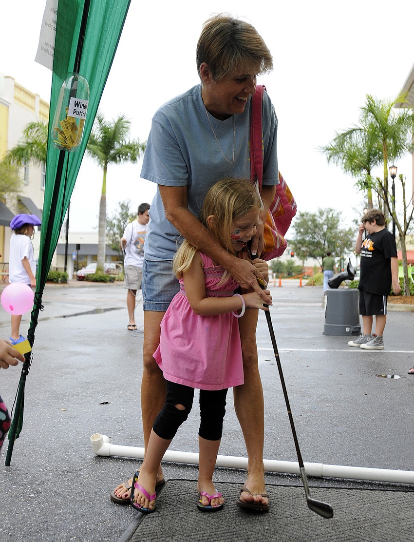 Four-year-old Kylie Sollenberger came out to play with her grandma Laura Sollenberger.