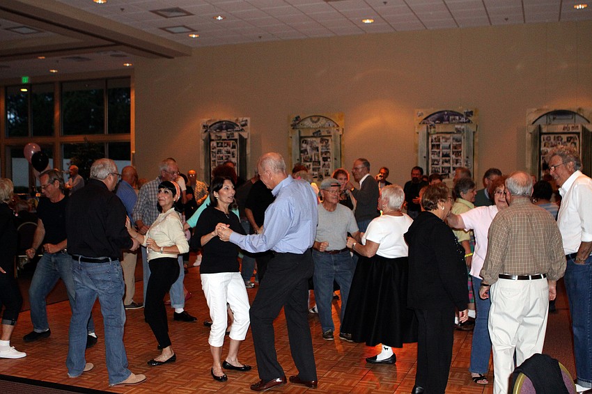 People have fun dancing to some of their favorite 50â€™s songs during Temple Sinaiâ€™s 50s Sock Hop fundraiser on Saturday.