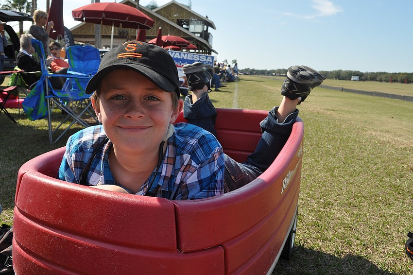 Gullett Elementary School student Dawson Britt, 9, found a comfortable seat fro which to watch the polo match.