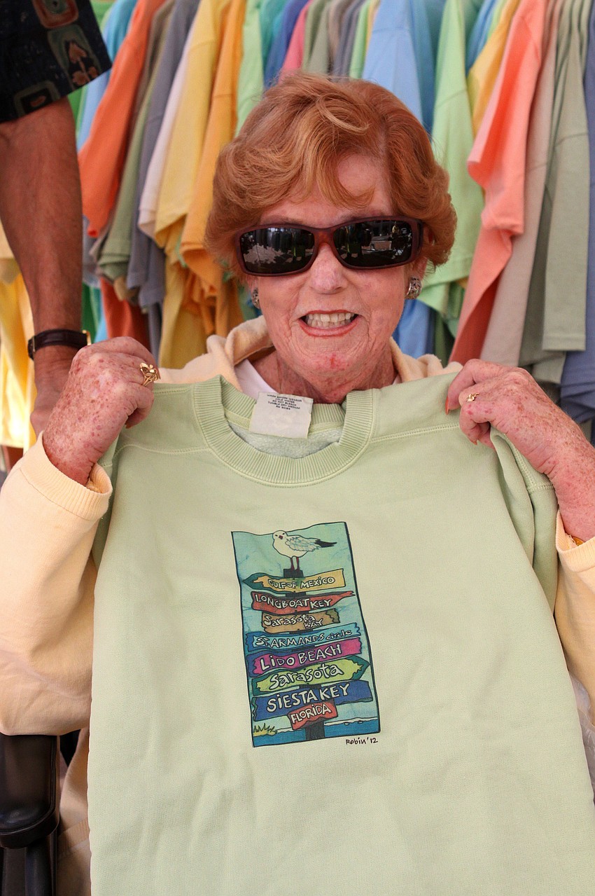 Nancy Grecni picked up a custom-made sweatshirt by Robin Zimmerman of Batik Clothing, Saturday, Jan. 28.