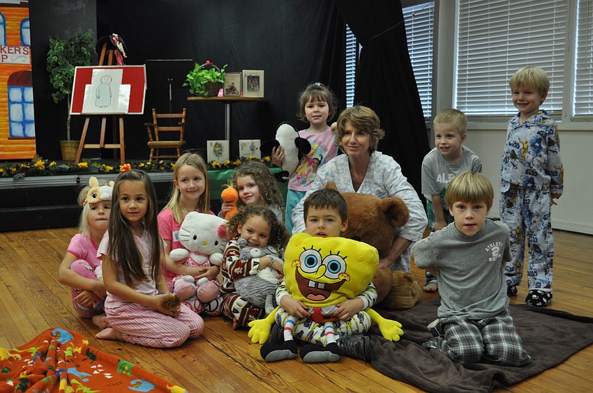 ODA students pose with librarian Glendy Huene.