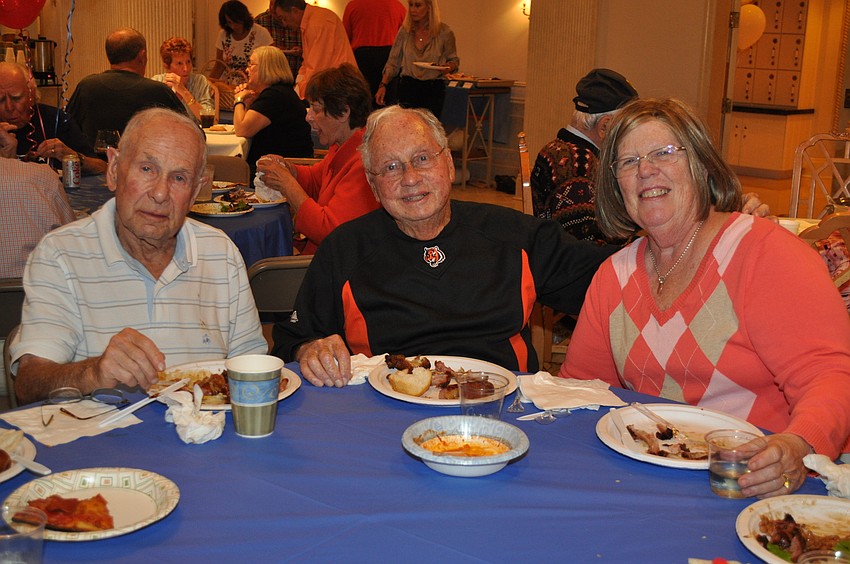 Charlie Greenhouse and Ira and Linda Abrahamson