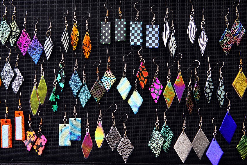 These earrings created by Karenâ€™s Kreations were made out of dichroic glass, which was developed by NASA and has been used in satellite optics and spacesuit visors.