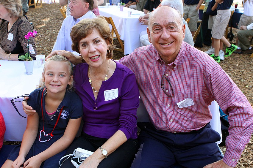 Ava Krug, K, sits with her grandparents Lorraine and Dick Vitale