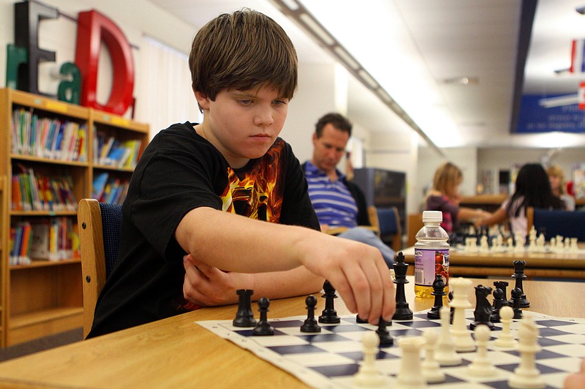 Thomas Good, the winner in 2011, makes his move during his first game of the day.