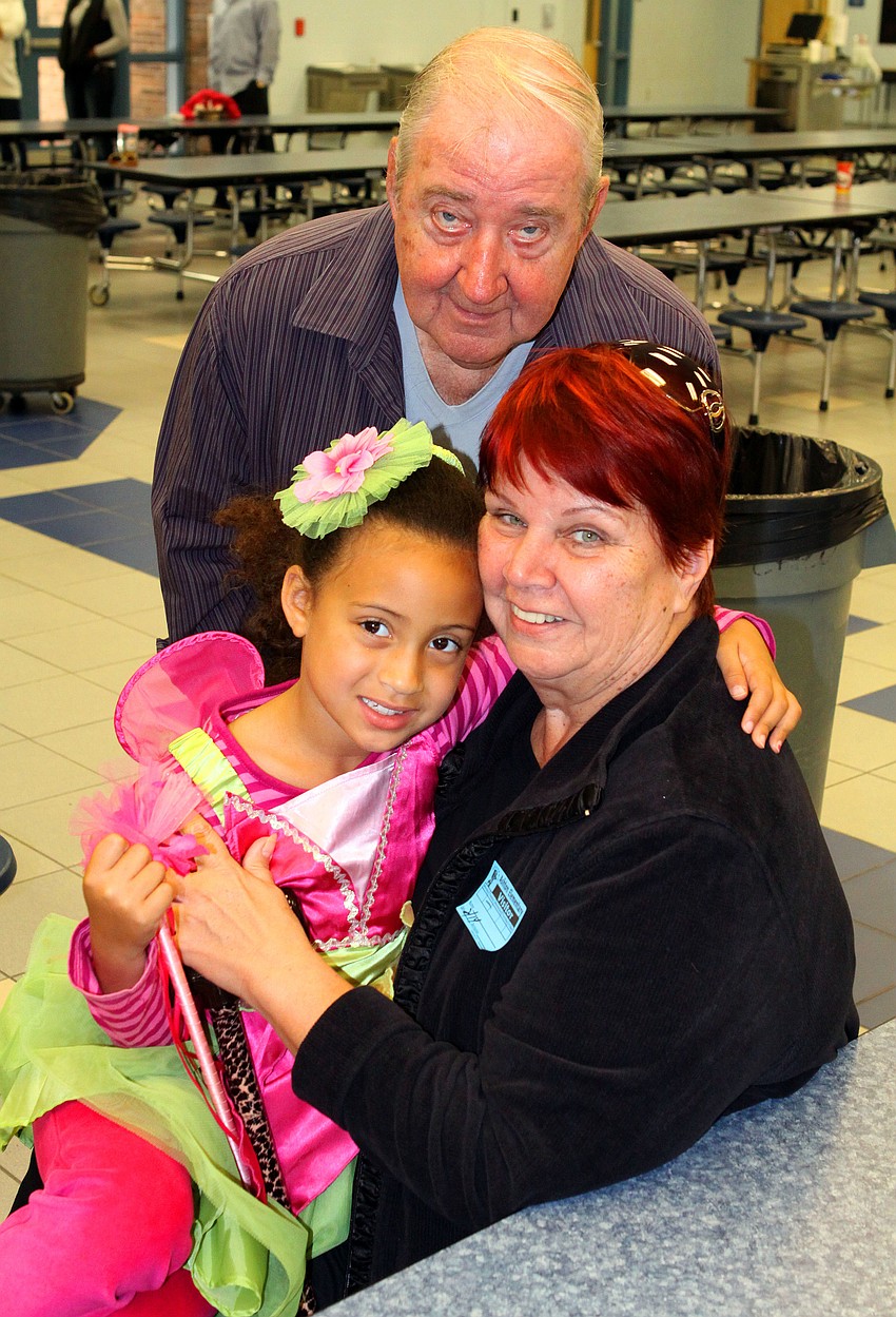 Sophia Gillespie, 5, with Lois and Mike Ritter