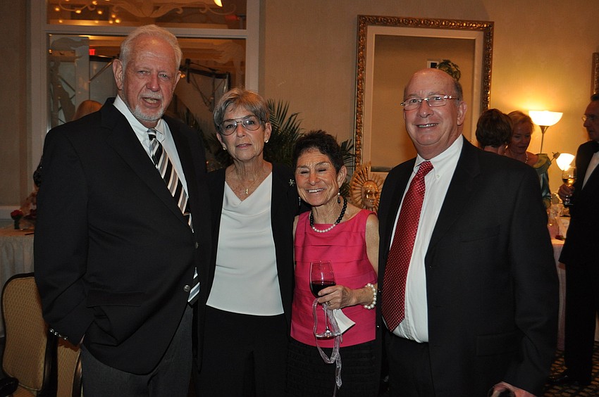 George and Madelyn Spoll with Susan and Lenny Landau