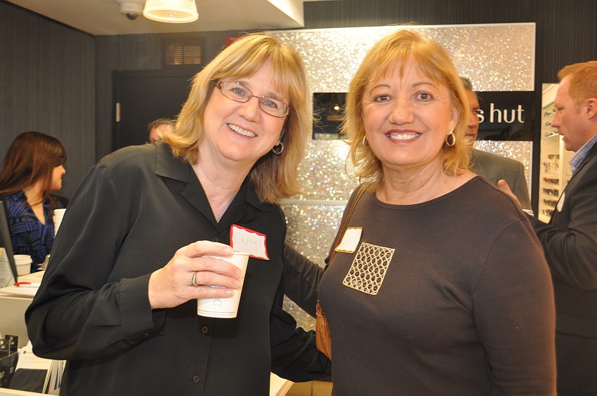 Cheryl Schmidt with David Oâ€™Keefe Studios and Chris Lynch Co-Owner of Lynches Pub and Grub