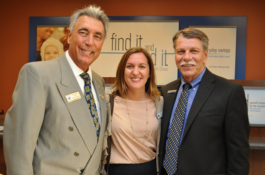 President of the Circle Association Andrew Vac, Stacy Alexander with Mote, and Chuck Montogmery