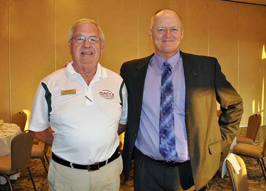 John Macy of Macyâ€™s Termite and Pest Control and Sigg Nagele of the Clearwater Chargers