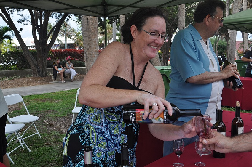 Carren Burnell with Manatee Childrenâ€™s Services pouring Eagle Eye