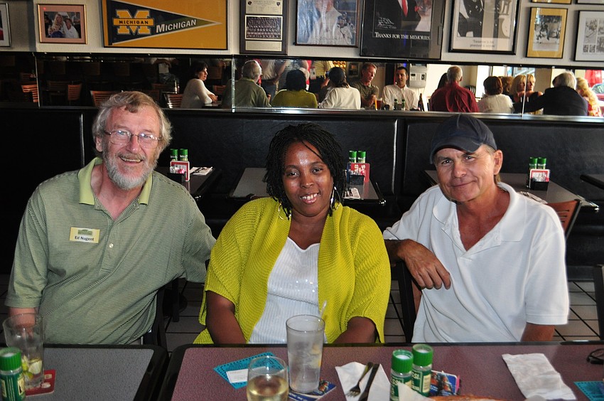 Ed Nugent with Cornerstone Signs and Graphics, Shantell Mankowski with LLSA Chamber of Commerce and Jeff Stephens with Kathleen D. Sailing Catamaran