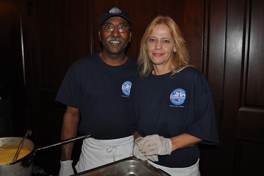 Chef Wade Moore, of BlueQue Island Grill, and his wife, Joan, dished out their special fried macaroni and cheese balls.