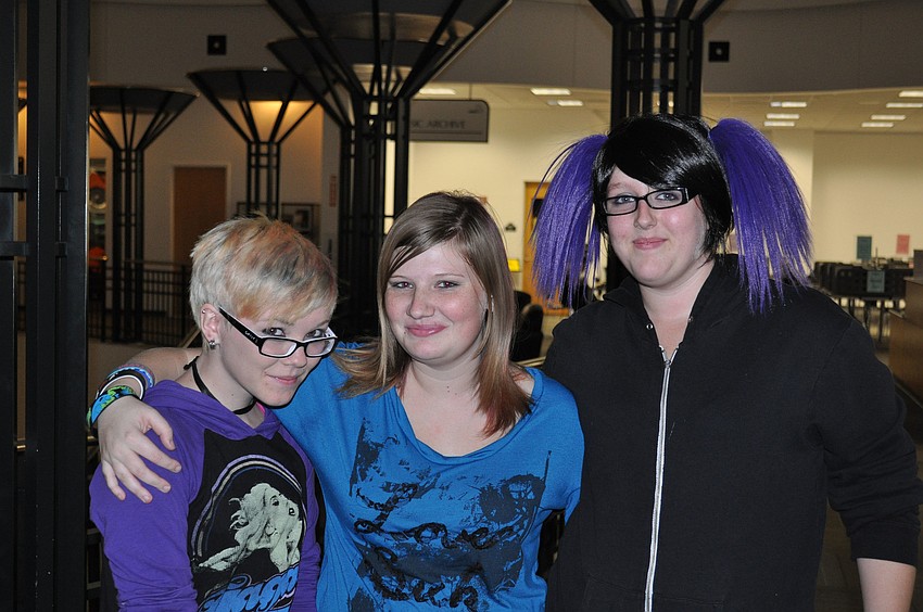Maranda Knoblock, Alyssa Varner and  Danielle Alvis pose together during a performance by UnEven LaNes.