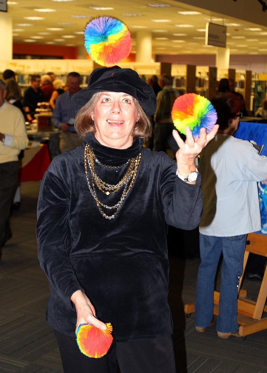 Meg Glidewell did a juggling act and even gave lessons, Friday, Jan. 13, at Selby Public Library's Looking Into the Crystal Ball event.