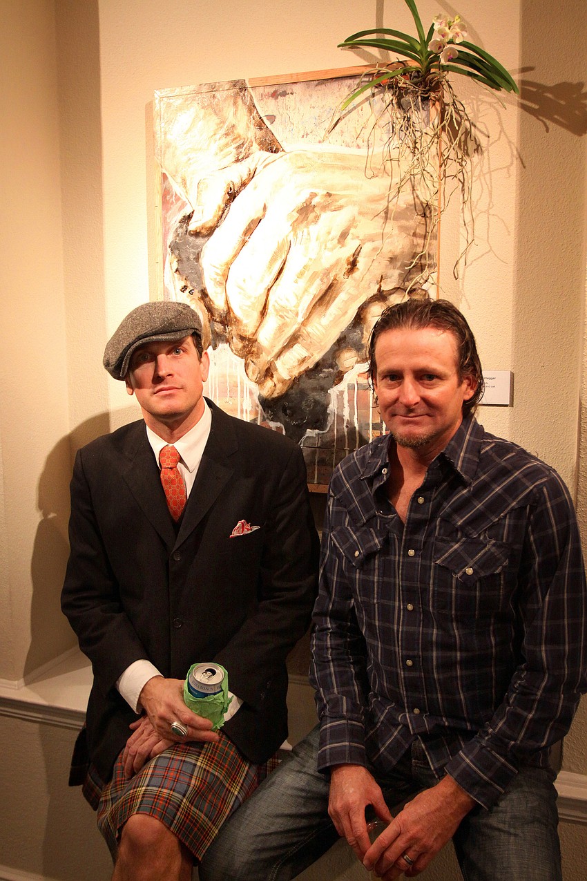 Joseph Arnegger and Tom Stephens pose in front of Arnegger's piece 