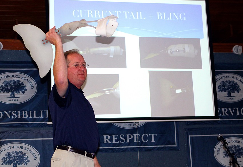 Dan Strzempka explains how Winter's prosthetic tail works, Friday, Jan. 20, at Out-of-Door Academy.
