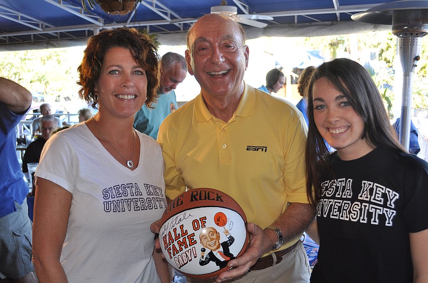 Dick Vitale poses with JoEllen and Brooke Mettille. The Mettilles own Siesta Key University on Ocean Blvd.