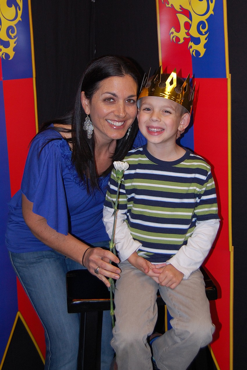 Joy Joiner and son Alex posed for a free picture to take home.
