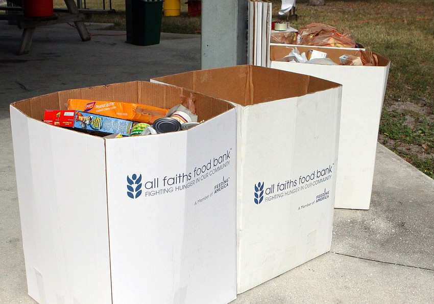 People brought cans of food to donate to All Faiths Food Bank. Four dollars from every entry fee for the tournament also went towards the food bank.