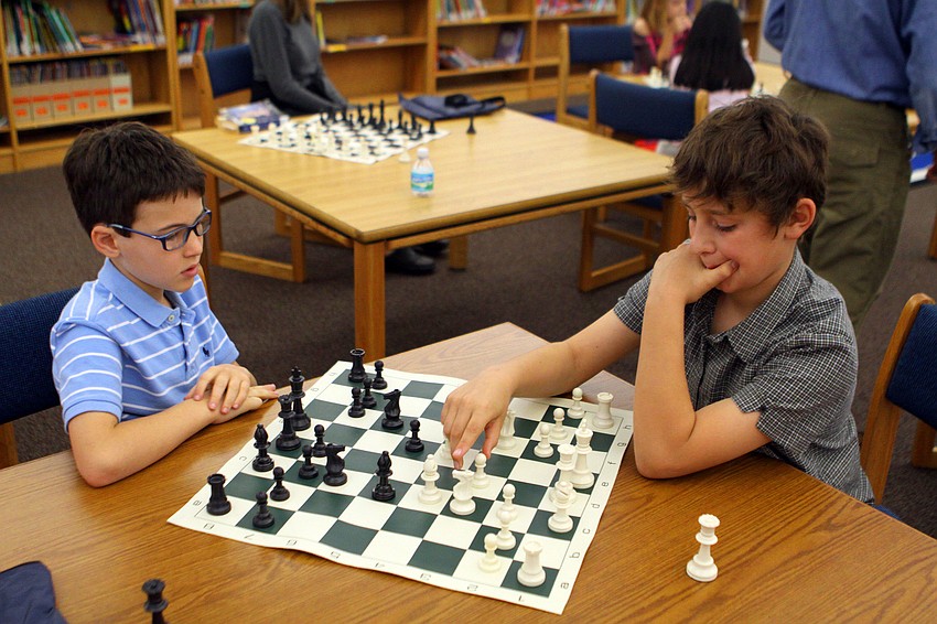 David Jacobs and Dylan Calcorzi play one another, Saturday, Feb. 11, in the library at Phillippi Shores Elementary.