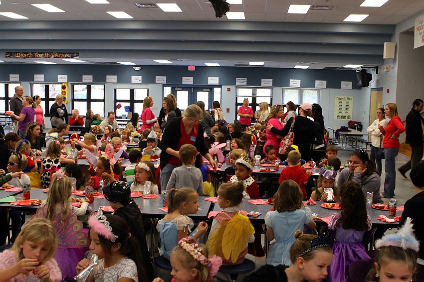 The Kindergarteners enjoyed a Valentine's themed breakfast with juice, strawberries and Dunkin' Donuts donuts.