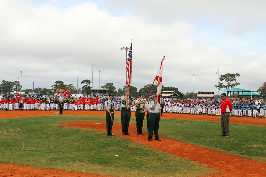 The Riverview Color Guard presented the colors and Alyssa Christensen, 17, sang the National Anthem, Saturday, Feb. 18, at the opening day ceremony for Sarasota Little League.
